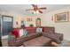 Comfortable living room featuring a large sectional sofa and cozy decor at 39 Selma Dr, Mooresville, NC 28115