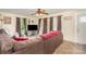 Cozy living room with carpet, a large sectional sofa, and natural lighting at 39 Selma Dr, Mooresville, NC 28115