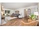 Bright living room with hardwood floors, comfortable seating, and access to outdoor space at 400 S Westover Dr, Monroe, NC 28112