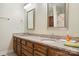 Bathroom boasts a double vanity with granite countertops, framed mirrors, and ample storage at 4026 Biggerstaff Rd, Maiden, NC 28650