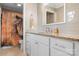 Updated bathroom with granite countertop, white cabinets, and decorative shower curtain at 4026 Biggerstaff Rd, Maiden, NC 28650