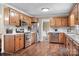 A spacious kitchen with stainless steel appliances, oak cabinetry, and tile backsplash at 4026 Biggerstaff Rd, Maiden, NC 28650