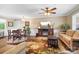 Cozy living room with an entertainment center fireplace, comfortable seating, and dining area at 4026 Biggerstaff Rd, Maiden, NC 28650