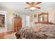 Main bedroom features traditional decor, wooden furniture, and ensuite bathroom at 4026 Biggerstaff Rd, Maiden, NC 28650