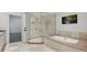 Bathroom showcasing a glass-enclosed shower, soaking tub, and modern fixtures at 4300 Cameron Oaks Dr, Charlotte, NC 28211