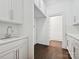 Kitchen featuring white cabinets and countertops at 4300 Cameron Oaks Dr, Charlotte, NC 28211