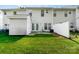 Large, grassy backyard, shed, patio, privacy fence, and house in background at 5322 Jocelyn Ln, Charlotte, NC 28269