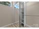 This closet features shelving for ample storage solutions and sliding doors at 5916 Cashion Rd, Huntersville, NC 28078