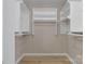 A custom walk-in closet featuring built-in shelves and clothing rods maximizes the storage space at 5916 Cashion Rd, Huntersville, NC 28078