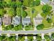 Aerial view highlighting the lot's boundaries in a neighborhood filled with lush greenery and trees at 622 Lorain Nw Ave, Concord, NC 28027