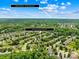 Beautiful aerial shot showcasing the neighborhood with Charlotte skyline in the distance at 622 Lorain Nw Ave, Concord, NC 28027