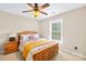Comfortable bedroom with a bed, side table, and natural light from a window at 622 Lorain Nw Ave, Concord, NC 28027