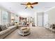 Open-concept living room flows into kitchen and dining area at 622 Lorain Nw Ave, Concord, NC 28027