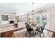 Inviting living room featuring a fireplace, built-in shelves, and ample natural light from french doors at 622 Lorain Nw Ave, Concord, NC 28027