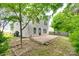 Backyard showing a brick patio and view of the home at 672 Carybrook Ct, York, SC 29745