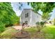 Backyard showing a brick patio and view of the home at 672 Carybrook Ct, York, SC 29745