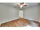 Bright bedroom boasts wood floors, fan, and natural light at 672 Carybrook Ct, York, SC 29745