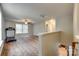 Upstairs bonus room with hardwood floors, natural light, and a view of downstairs at 672 Carybrook Ct, York, SC 29745