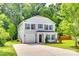 Charming two-story home with a well-manicured lawn, inviting curb appeal and attached one car garage at 672 Carybrook Ct, York, SC 29745