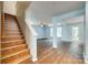 Lower level living room with stairs leading up to another level and a door leading outside at 672 Carybrook Ct, York, SC 29745