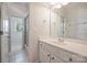 Bright bathroom vanity with framed mirror at 7319 Stonehaven Dr, Waxhaw, NC 28173