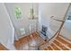 Spacious foyer with hardwood floors, a grand staircase, a chandelier, and lots of natural light at 7319 Stonehaven Dr, Waxhaw, NC 28173