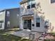 Backyard with a concrete patio, sliding glass doors, and proximity to adjacent homes at 7323 Jane Parks Way, Charlotte, NC 28217