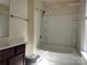 Cozy bathroom featuring a shower-tub combo and vanity at 7323 Jane Parks Way, Charlotte, NC 28217