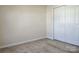 Cozy bedroom featuring plush carpeting and a spacious closet for ample storage at 7323 Jane Parks Way, Charlotte, NC 28217