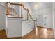 Foyer with hardwood floors, light-filled entry with staircase and white trim at 765 Portpatrick Pl, Fort Mill, SC 29708