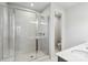 Contemporary bathroom featuring a glass-enclosed shower, dual vanity, and clean, modern finishes for a spa-like experience at 9142 Widden Way, Charlotte, NC 28269