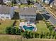 Aerial view of the property featuring a pool and covered outdoor living space at 1001 Hampton Grove Rd, Waxhaw, NC 28173