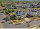 Aerial view of a landscaped home with a manicured lawn and mature trees at 1001 Hampton Grove Rd, Waxhaw, NC 28173