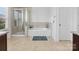 Well-appointed bathroom featuring a soaking tub, glass-enclosed shower, and tile flooring at 1001 Hampton Grove Rd, Waxhaw, NC 28173