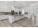 Bright and spacious kitchen featuring an island, stainless steel appliances, and ample white cabinetry at 1001 Hampton Grove Rd, Waxhaw, NC 28173