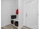Mudroom entryway featuring coat hooks, bench with storage baskets, and a door to the exterior at 1001 Hampton Grove Rd, Waxhaw, NC 28173