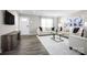 Inviting living room features a comfortable sofa, a modern coffee table, and large windows that offer natural light at 10116 Florentine Way, Charlotte, NC 28214