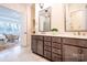 Bright bathroom with dual vanities featuring gray cabinetry, stylish mirrors, and contemporary fixtures at 1059 Sage Pine Cir, Clover, SC 29710