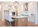 Bright kitchen features an island, pendant lighting, stainless appliances, and ample cabinet space at 1059 Sage Pine Cir, Clover, SC 29710