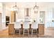 Bright kitchen features an island, pendant lighting, stainless appliances, and ample cabinet space at 1059 Sage Pine Cir, Clover, SC 29710