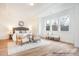 Spacious main bedroom with large windows, hardwood floors, elegant furnishings, and ample natural light at 1059 Sage Pine Cir, Clover, SC 29710