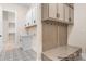 Functional mudroom with ample storage, built-in bench, and patterned flooring; perfect for organization at 1059 Sage Pine Cir, Clover, SC 29710