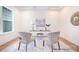 Well-lit home office with neutral colors, stylish chairs, and a decorative mirror that adds sophistication at 1059 Sage Pine Cir, Clover, SC 29710
