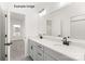 Bright bathroom features a double sink vanity and walk in shower at 11009 Tyler Brook Ln # Oak0043, Mint Hill, NC 28227