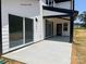 An inviting outdoor patio with sliding glass doors offers a perfect space for relaxing or entertaining at 11009 Tyler Brook Ln # Oak0043, Mint Hill, NC 28227