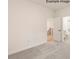 Bright room features a doorway leading to bathroom and stairs at 11009 Tyler Brook Ln # Oak0043, Mint Hill, NC 28227