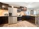 Well-appointed kitchen featuring stainless steel appliances, rich cabinetry, and modern fixtures for cooking at 1116 S Juniper St, Kannapolis, NC 28081