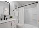 Bathroom features a shower and tub combo with modern vanity at 1231 Maple Shade Ln, Charlotte, NC 28270