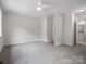 Spacious bedroom with ceiling fan includes attached bathroom at 1231 Maple Shade Ln, Charlotte, NC 28270