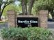 A brick sign identifies the Sardis Glen Townhome community at 1231 Maple Shade Ln, Charlotte, NC 28270